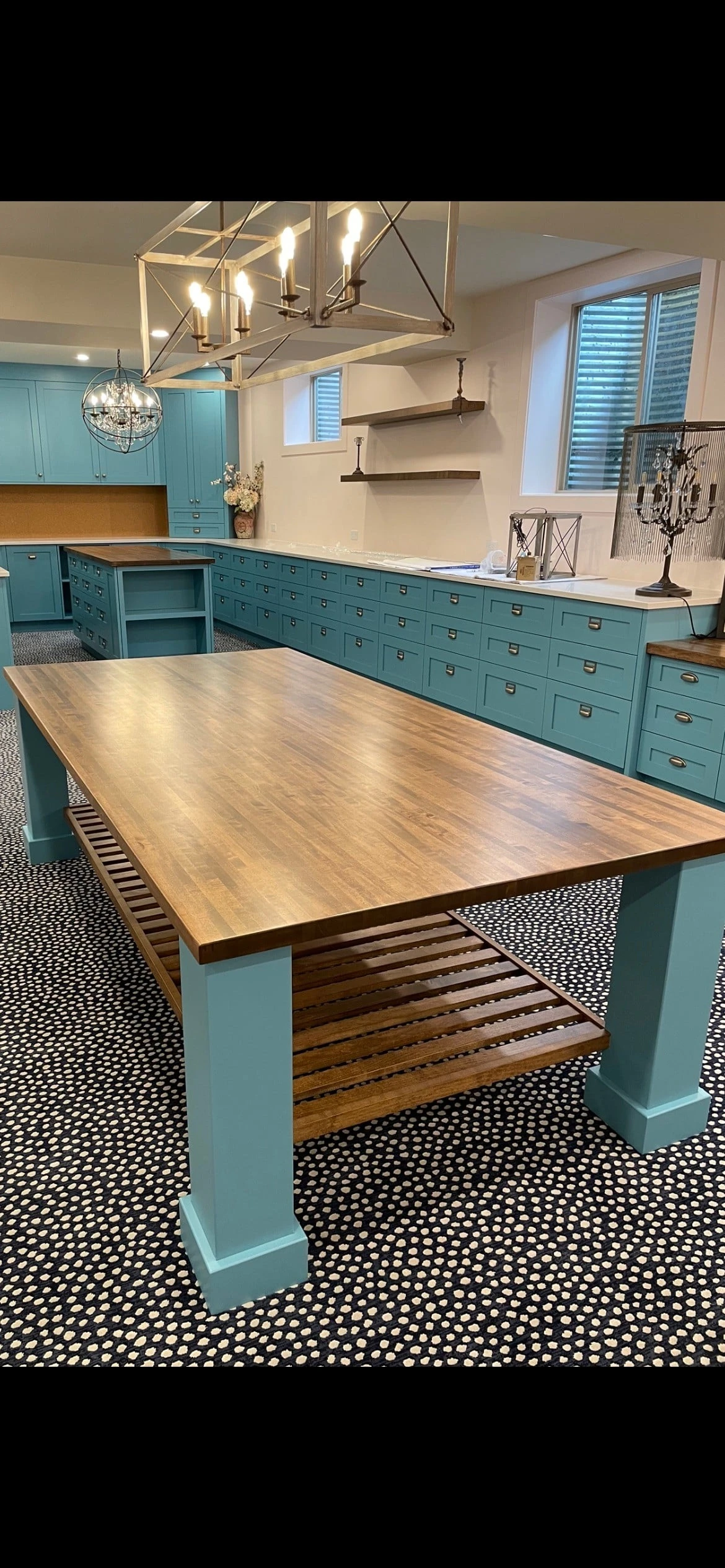 Stellar Craft Cabinetry Inc custom kitchen cabinetry with blue cabinets and large island