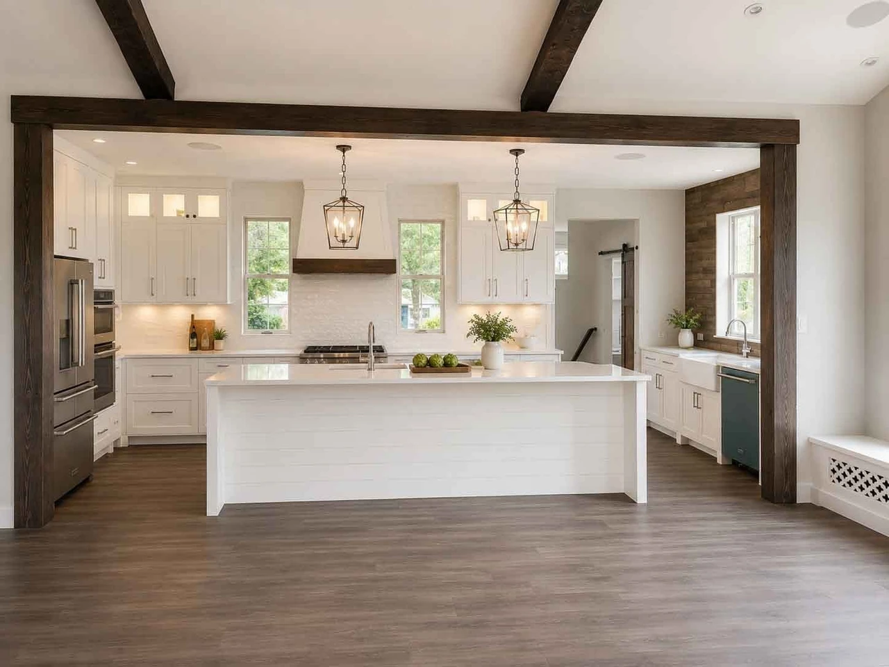 Stellar Craft Cabinetry Inc. modern kitchen with custom white cabinetry, dark wood accents, and kitchen island