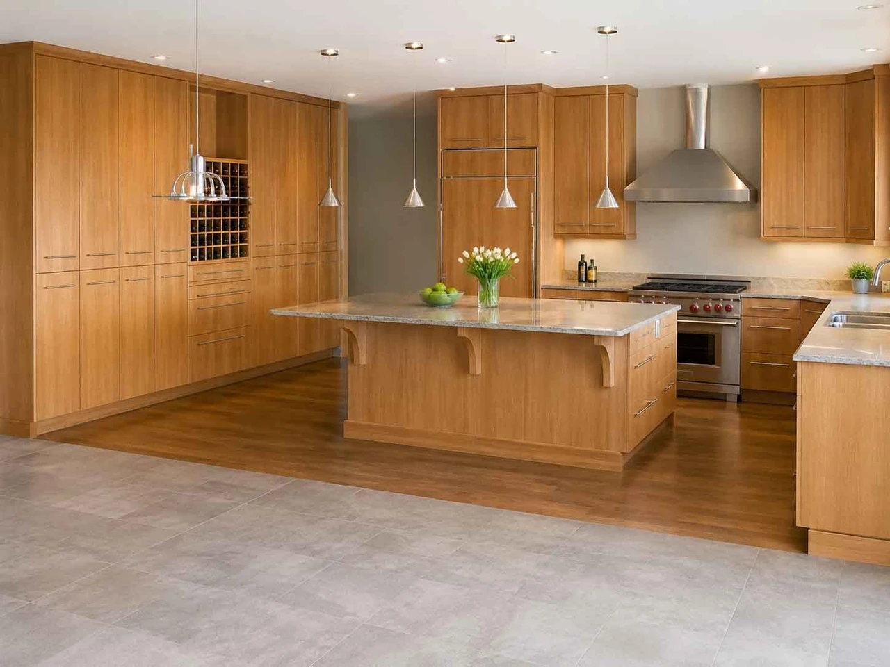 Stellar Craft Cabinetry Inc. custom kitchen with warm wood cabinetry and central island